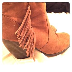 Tan suede bottles with fringe