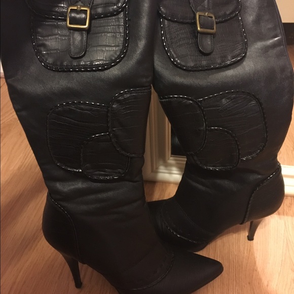 Tall black heel boots