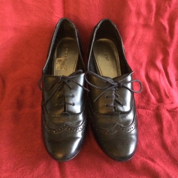 Black wing tip heels