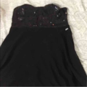A black and glittery above the knee XL Gucci dress