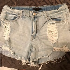 Destroyed denim shorts
