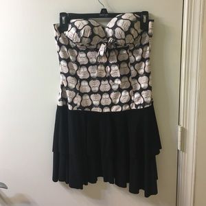Waist-Hugging Black Mini-Dress With Print