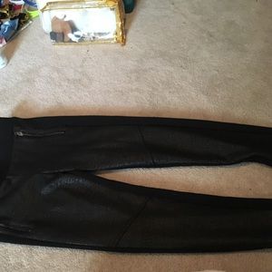 Leggings with leather like material on front
