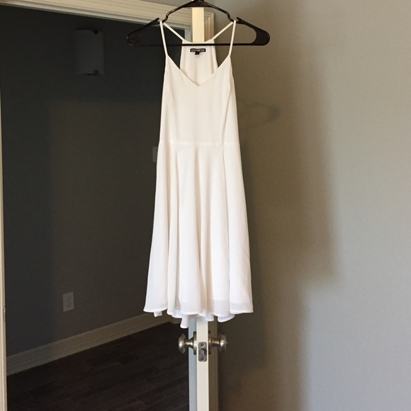 White short dress, side zip up.