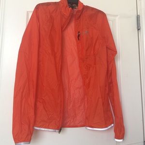 Under Armour running cold gear sheet jacket.