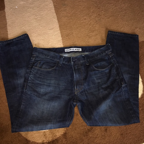 Slim fit dark wash w/ slight fade. Great Condition