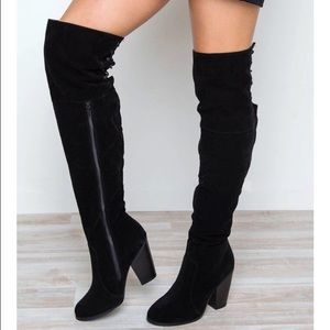 Over the knee black boots
