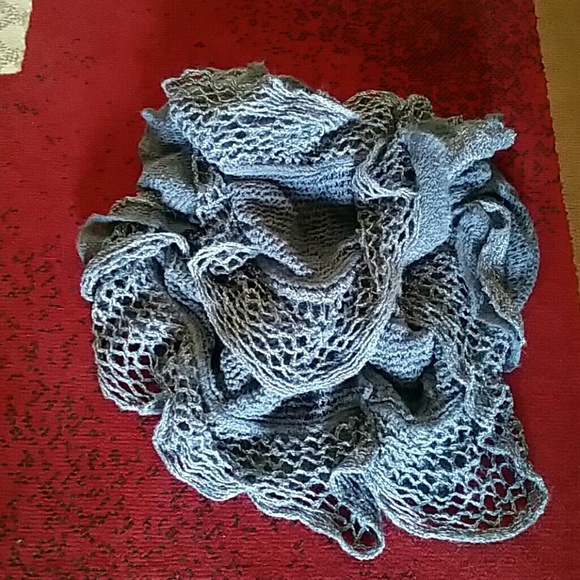 Gray infinity scarf with shimmer specks.