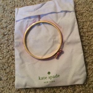 Kate Spade pink and gold bow bangle