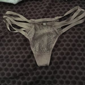 Very sexy, strappy thong. Never worn