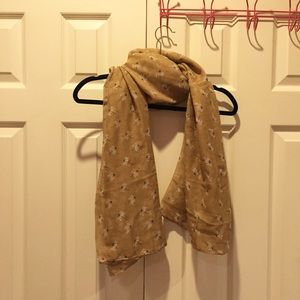 Tan woven BP scarf with dandelion print