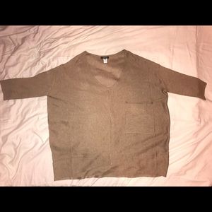 Brown sweater. Can be a size small or medium.
