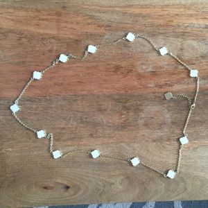 Long cream and gold necklace