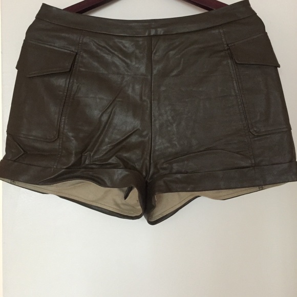 Never worn faux leather shorts, dark green