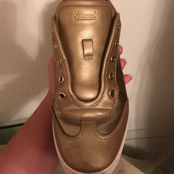 Authentic Gold Gucci sneakers