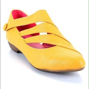 Funky Yellow Flats with cut-outs from Modcloth