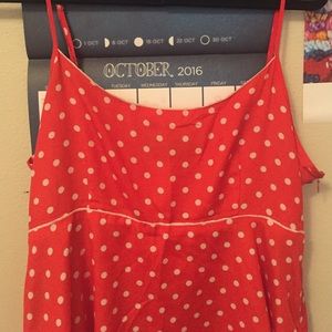 Orange and white polka dot swing dress