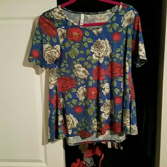 LulaRoe Roses Print.  Worn a few times.  Never Dyi