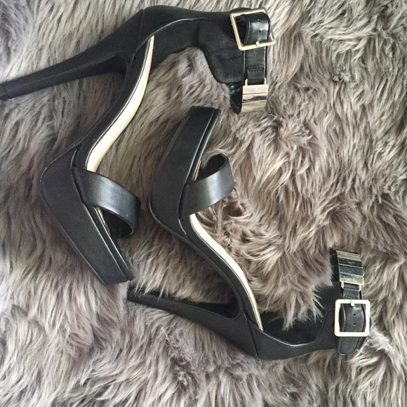 Black heels with silver ankle straps