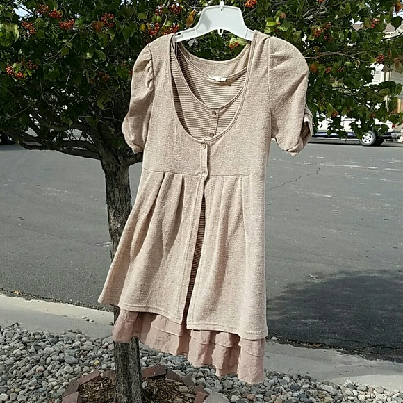 Bottom ruffle dress with cardigan.