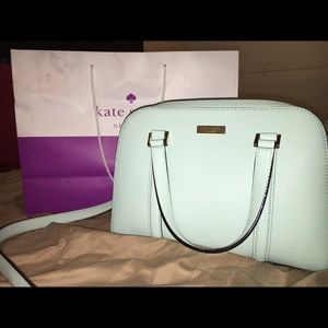 Light blue Kate spade purse with tag