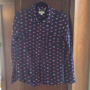 Button down navy shirt with pink and white whales.