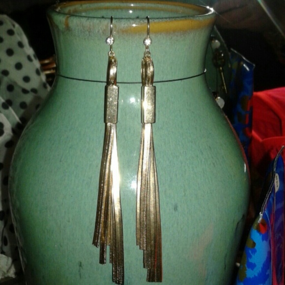 Guess gold tone long dangle earrings