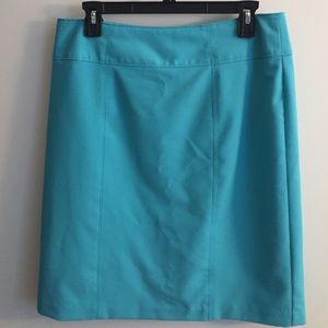 Turquoise skirt.
