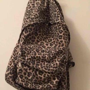 Leopard vs pink backpack