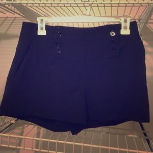 Black button shorts