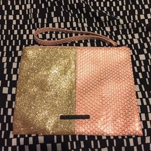 BCBGeneration pink and gold glitter wristlet