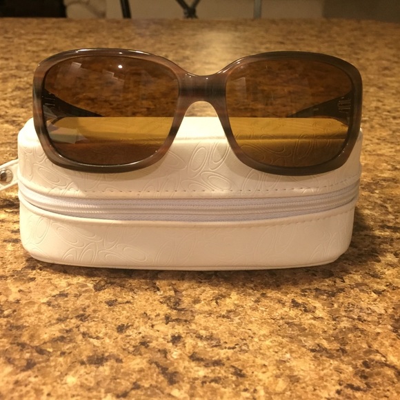 A pair of polarized Oakley sunglasses