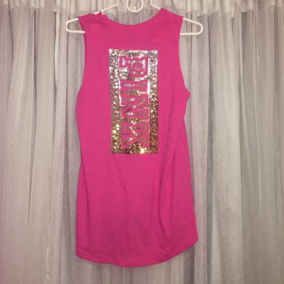 PINK TANK TOP WITH GOLD&SILVER SIGN IN THE BACK
