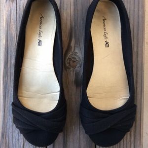 Black flats with detail.