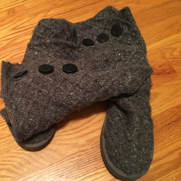 Tall grey UGG boots.