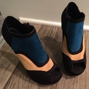 Black, teal, and gold peep toe ankle booties