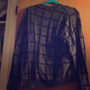 A grey oversized sweater