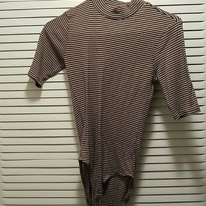 tan n black onesie shirt