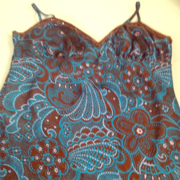 ***Clearance*** Xhilartion String top.