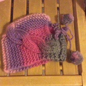 Handmade beanie with pom-poms