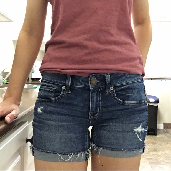 Distressed denim shorts