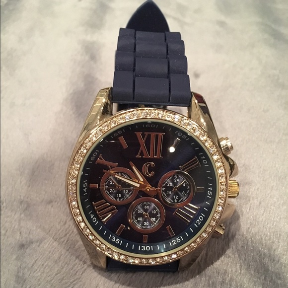 Charming Charlie's gold and navy blue wrist watch
