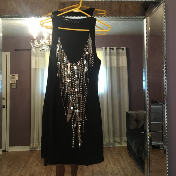 Beautiful black dress with silver detail. Size 6