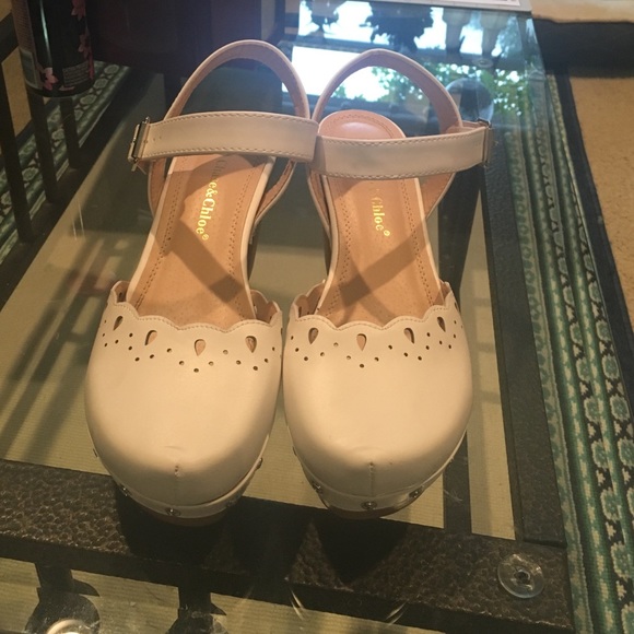 White scolloped clog heel