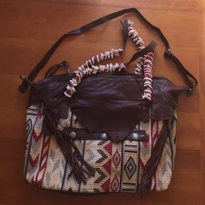 Free People Woven cloth and leather duffle.