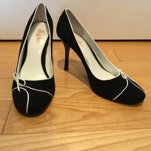 Black suede pumps by Charles David