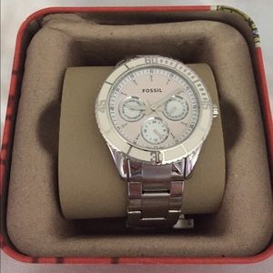 Silver fossil watch with white dial