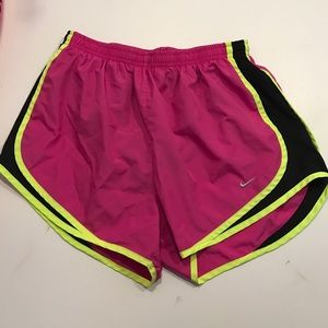 Nike pink, neon yellow and black running shorts