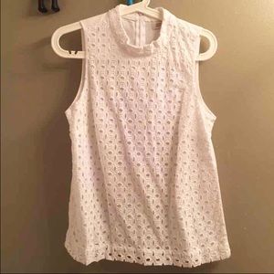 Eyelet tank with a high collar