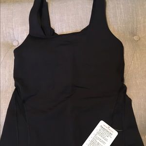 RISE AND FLOW TANK. SIZE 8
